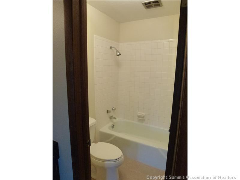 70 Evergreen Road, Unit 104 Dillon, CO 80435 - Photo 10 of 22 a bathroom with a bathtub and a toilet