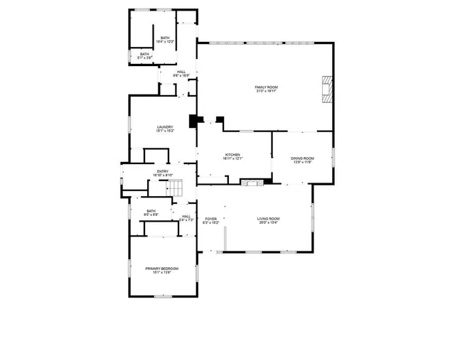 a living room with a fireplace and a fireplace