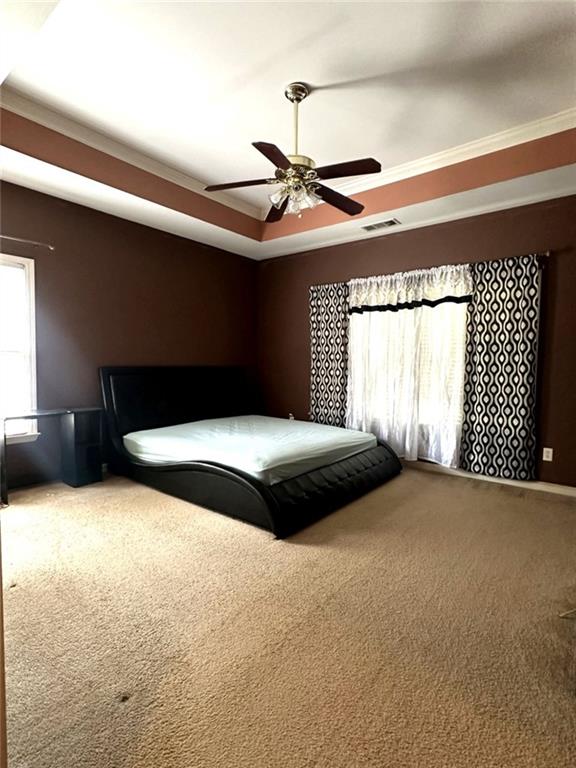 239 Sweet Cane Trail Grayson, GA 30017 - Photo 20 of 30 a bedroom with a bed and a window