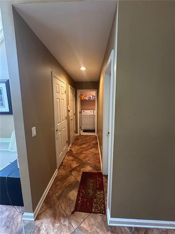 239 Sweet Cane Trail Grayson, GA 30017 - Photo 29 of 30 a view of hallway with wooden floor