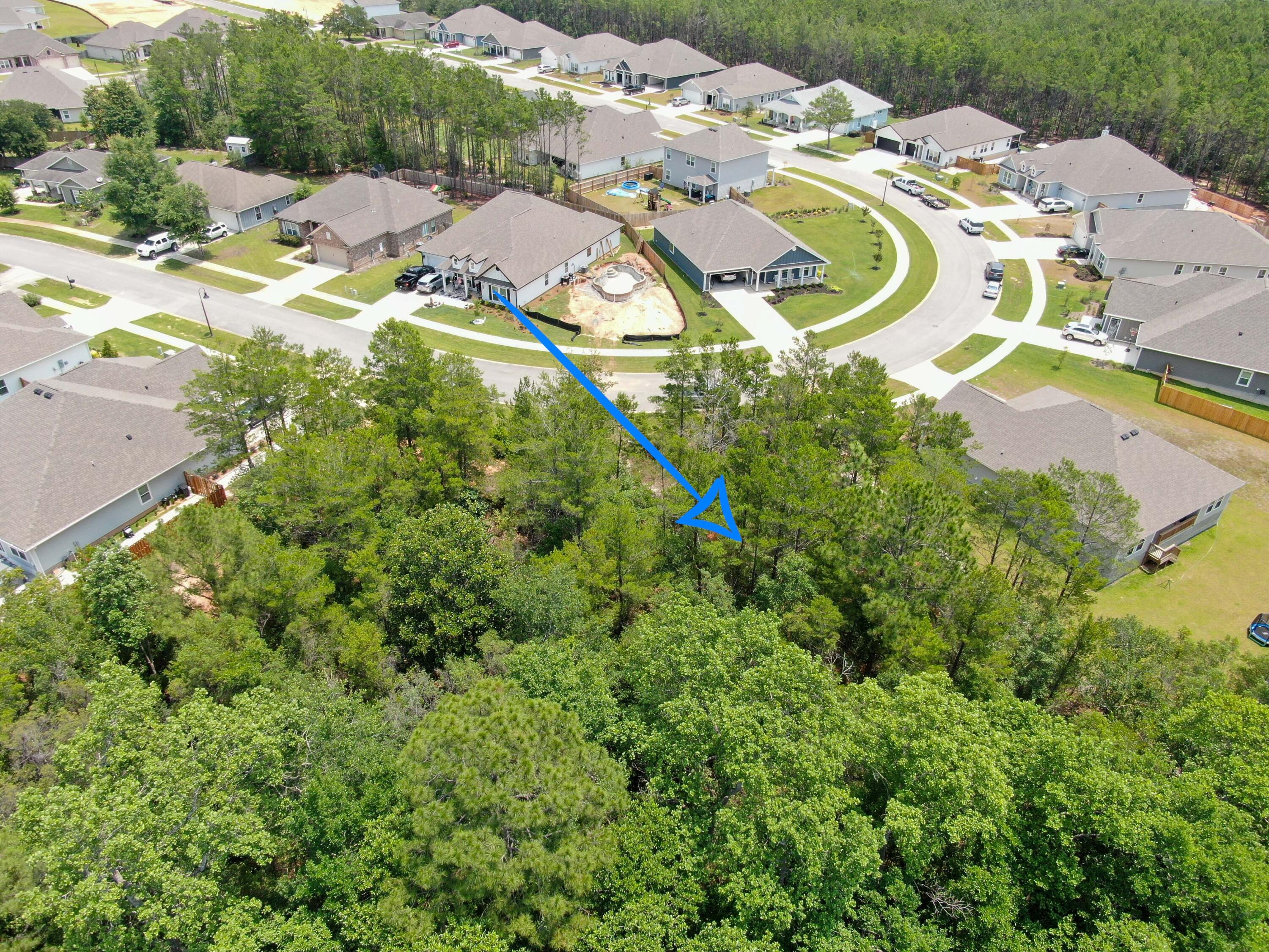Lot 24 Perimeter Place Freeport, FL 32439 - Photo 3 of 7 a aerial view of a house with a swimming pool