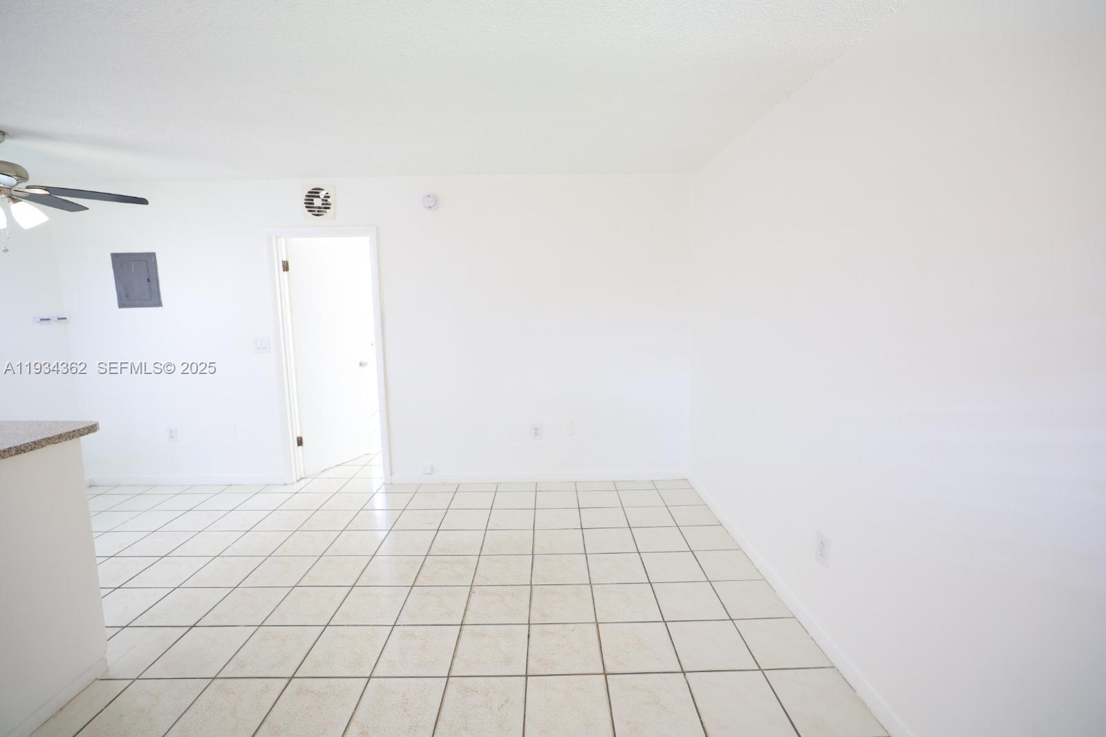 7155 West 14th Court, Unit 17 Hialeah, FL 33014 - Photo 6 of 12 a view of an empty room