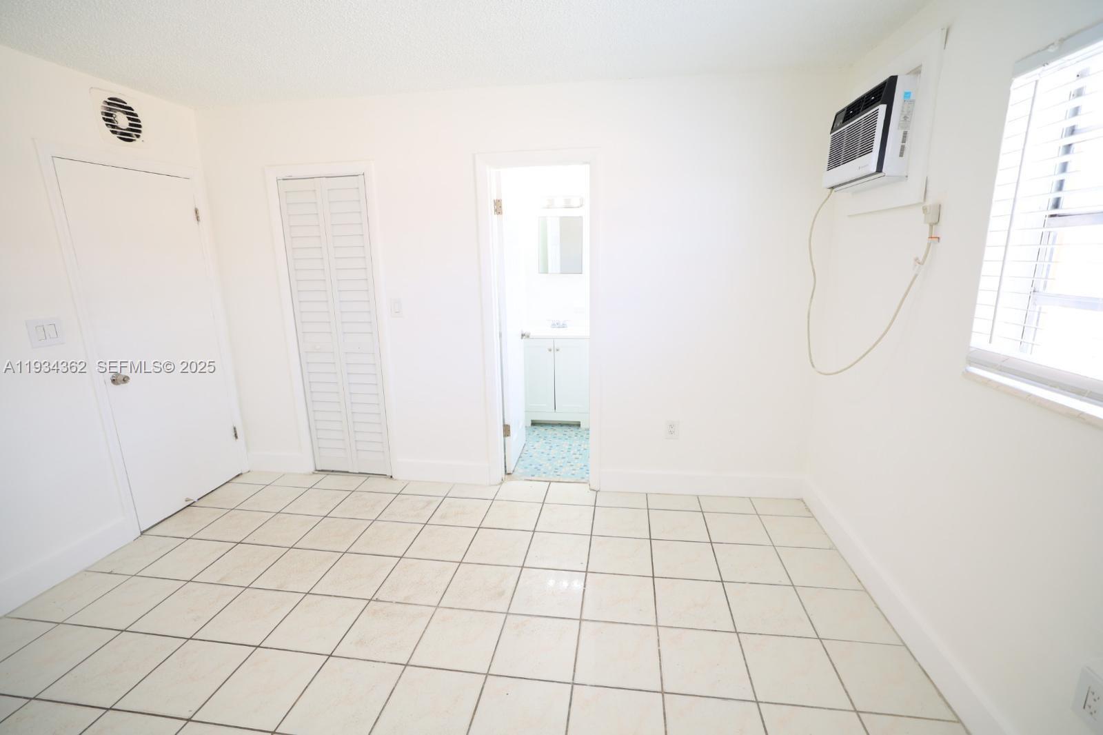 7155 West 14th Court, Unit 17 Hialeah, FL 33014 - Photo 7 of 12 a view of an empty room