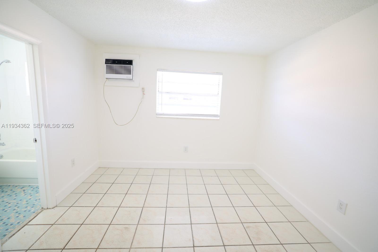 7155 West 14th Court, Unit 17 Hialeah, FL 33014 - Photo 9 of 12 a view of an empty room