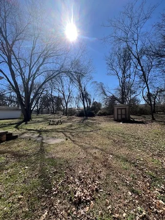 a view of yard covered with snow in outdoor space