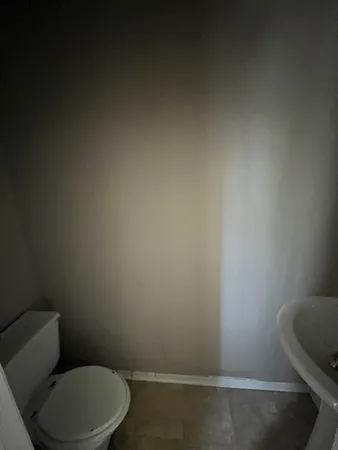 a bathroom with a toilet