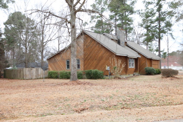 140 Timber Ridge Drive Macon, GA 31216 - Photo 13 of 15 a view of a house with a yard