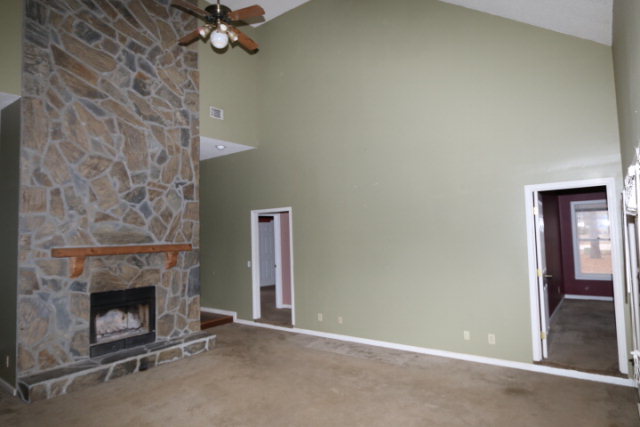 140 Timber Ridge Drive Macon, GA 31216 - Photo 3 of 15 an empty room with a fireplace