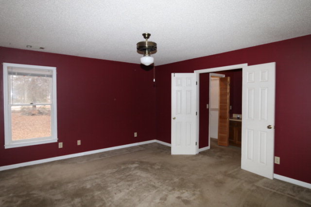 140 Timber Ridge Drive Macon, GA 31216 - Photo 4 of 15 a view of an empty room with a window