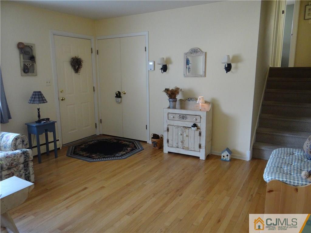 16 Baldwin Road Edison, NJ 08817 - Photo 4 of 12 a room with furniture and wooden floor