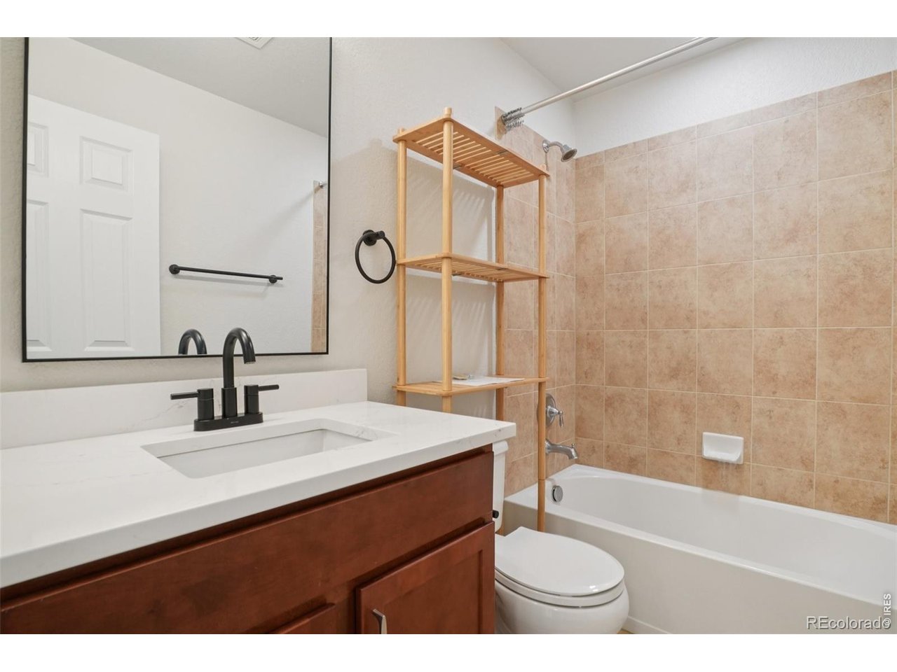 727 Rawlins Way Lafayette, CO 80026 - Photo 21 of 27 Hall bath next to second bedroom