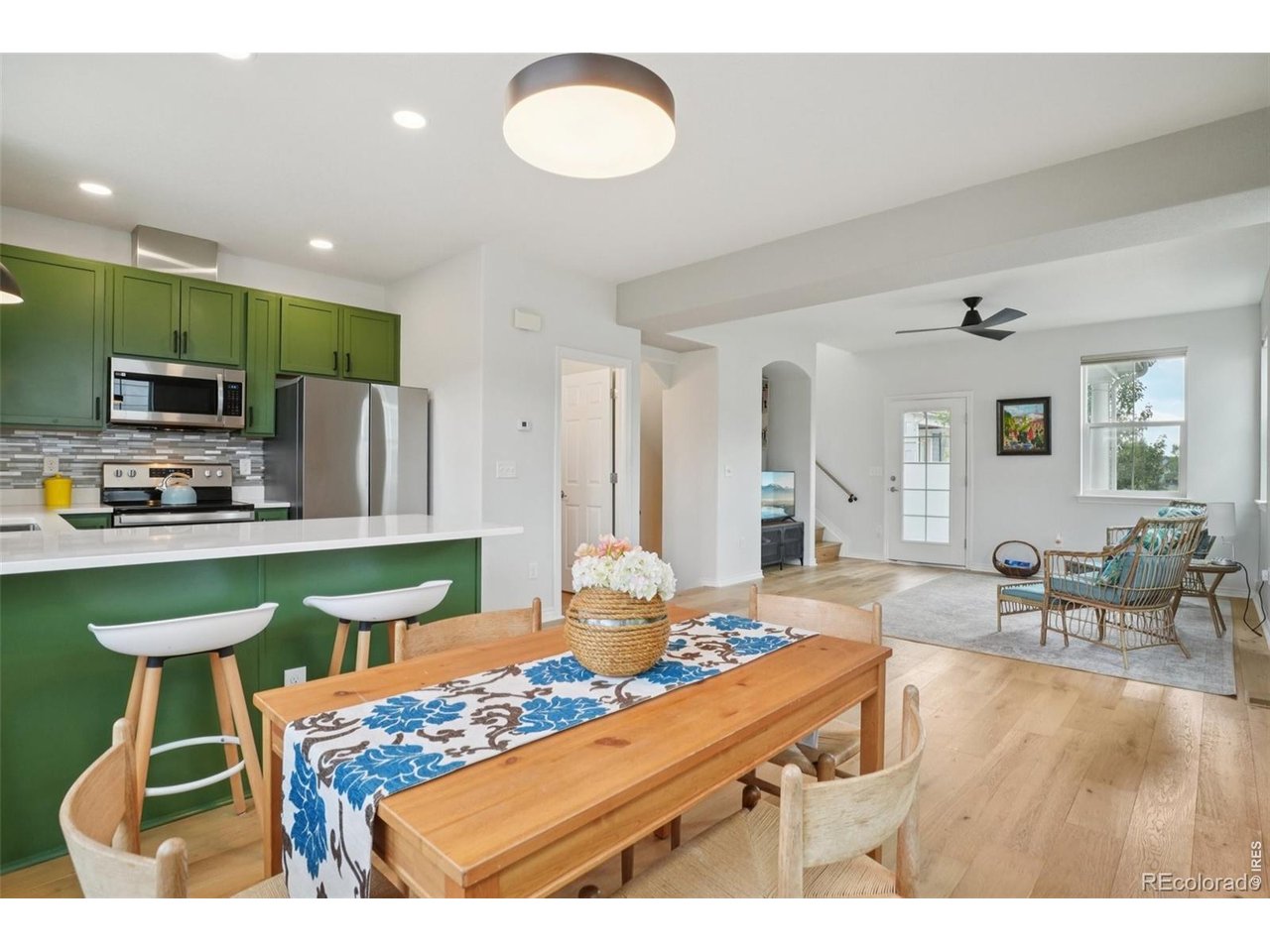 727 Rawlins Way Lafayette, CO 80026 - Photo 8 of 27 Dining area and Kitchen