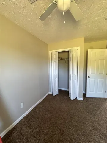 a view of a room with rack on the wall