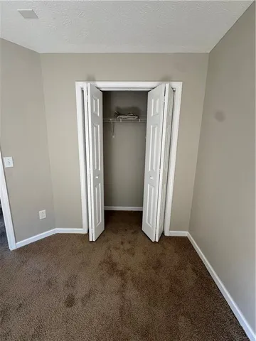 a bathroom with a sink a mirror and a window