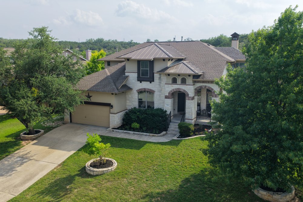 5528 Wild Foxglove Road Spicewood, TX 78669 - Photo 1 of 38 a aerial view of a house with yard