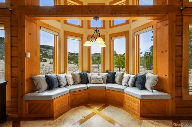 a view of a living room with furniture