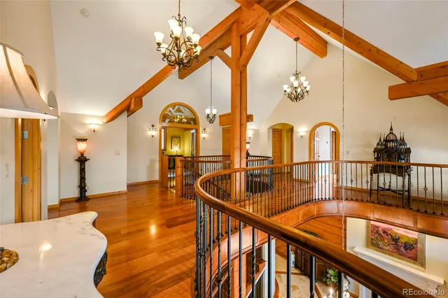 a dining room with a table and chairs