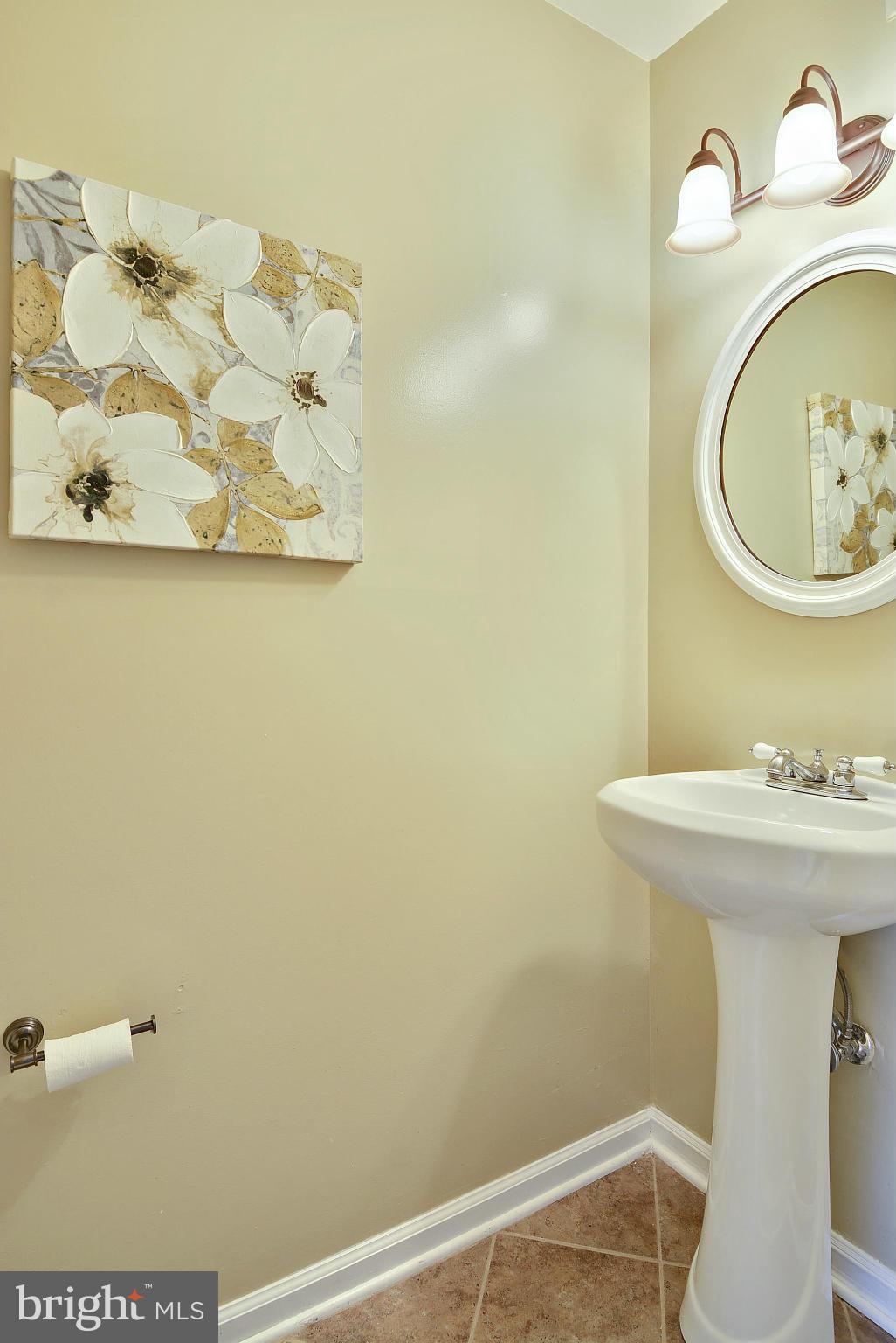 9049 Centerway Road Gaithersburg, MD 20879 - Photo 13 of 30 Powder Room with Pedestal Sink and New Floor