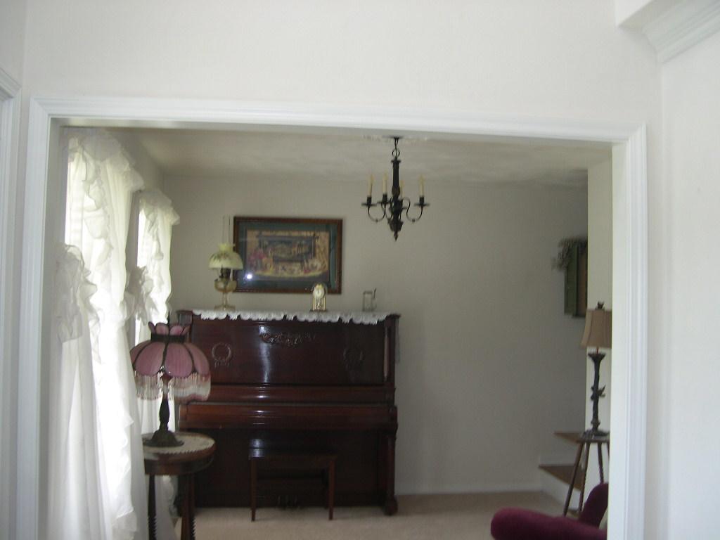 1770 Meadows Road Vinton, VA 24179 - Photo 17 of 37 a living room with furniture and a window