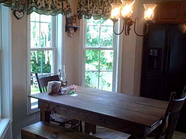 1770 Meadows Road Vinton, VA 24179 - Photo 4 of 37 a view of a dining room with furniture window and wooden floor