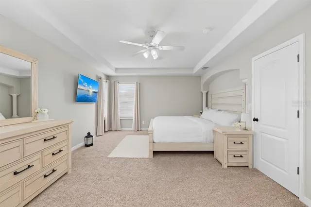 a view of an empty room with cabinet