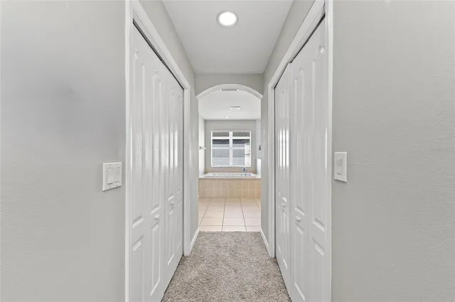 a bedroom with toys and a baby crib