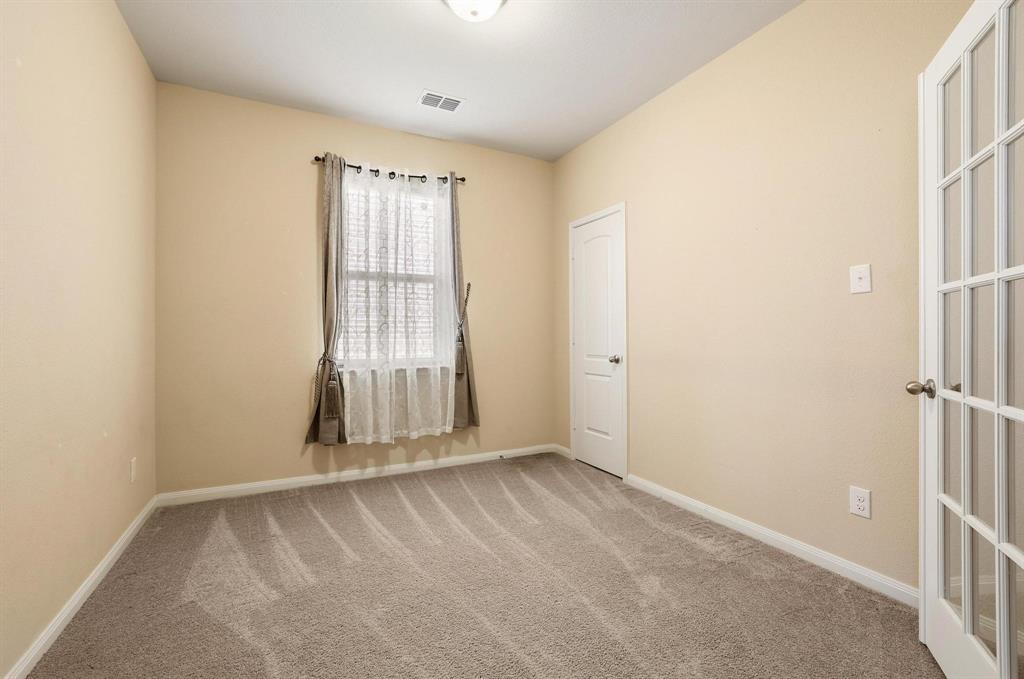3005 Parker Road Anna, TX 75409 - Photo 10 of 33 Unfurnished room with light carpet and baseboards