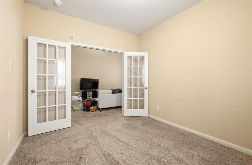 3005 Parker Road Anna, TX 75409 - Photo 12 of 33 Spare room featuring french doors and light colored carpet