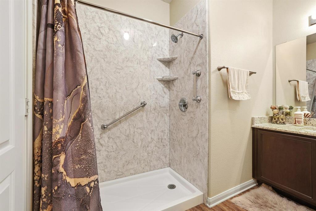 3005 Parker Road Anna, TX 75409 - Photo 17 of 33 Full bathroom with a shower stall and vanity