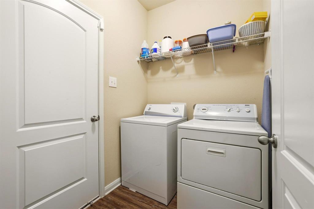 3005 Parker Road Anna, TX 75409 - Photo 21 of 33 Laundry room featuring dark wood-type flooring and washer and dryer
