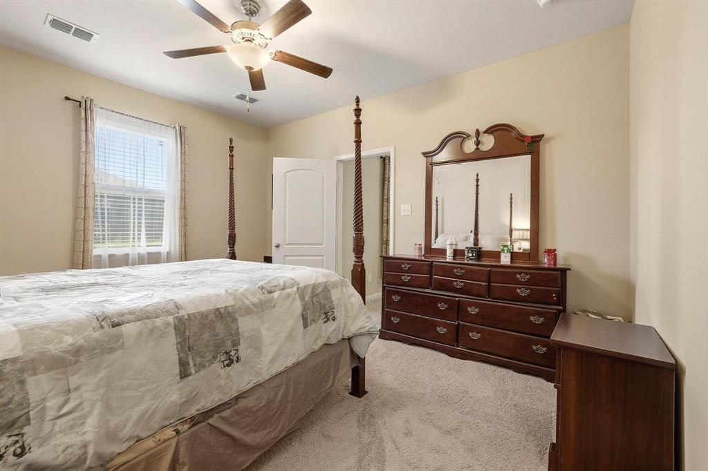 3005 Parker Road Anna, TX 75409 - Photo 23 of 33 Carpeted bedroom featuring a ceiling fan