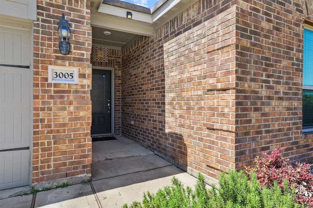 3005 Parker Road Anna, TX 75409 - Photo 3 of 33 View of exterior entry featuring brick siding