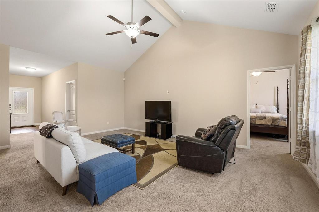 3005 Parker Road Anna, TX 75409 - Photo 5 of 33 Living area with carpet floors and a ceiling fan