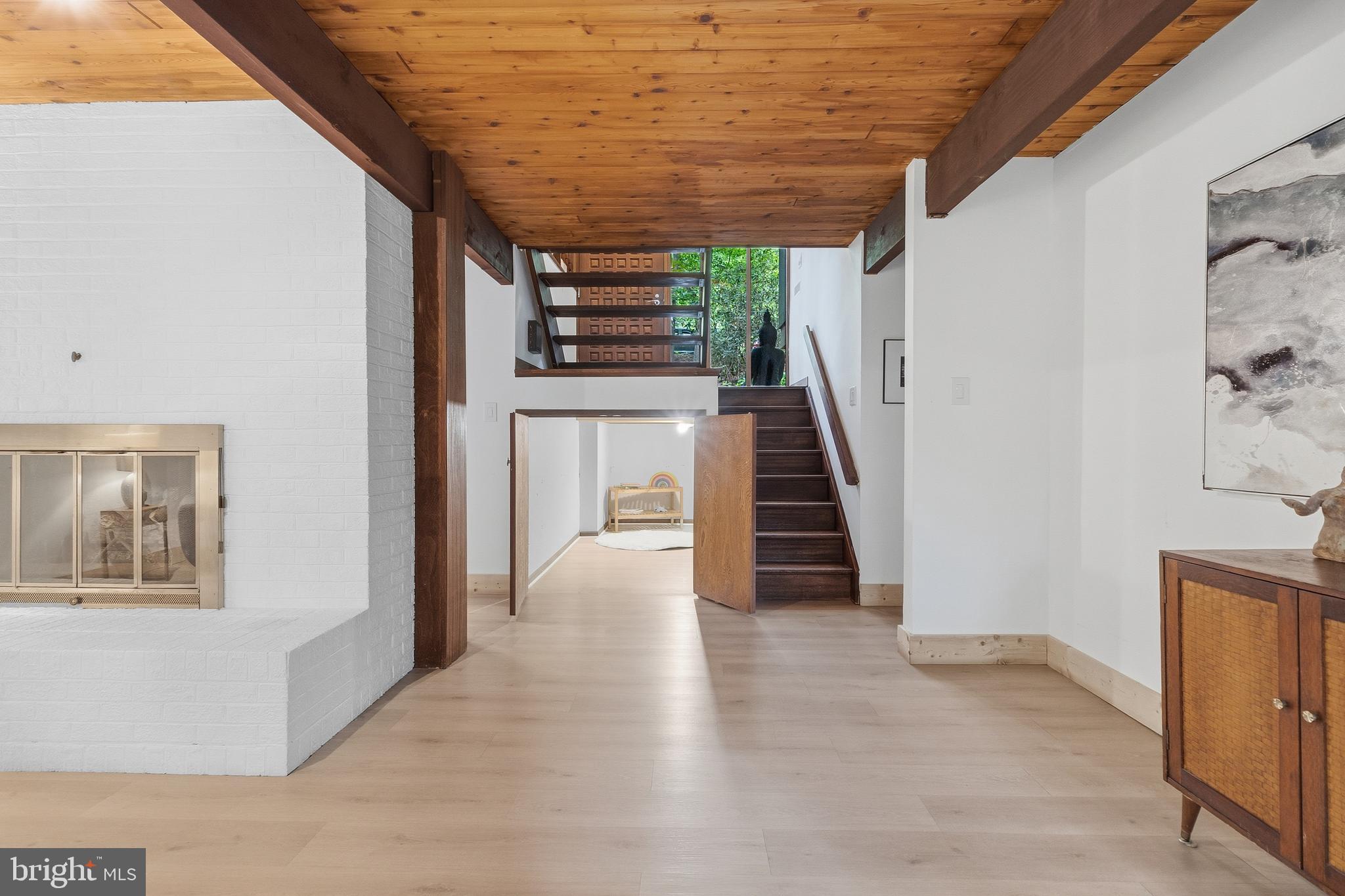 10815 Cross School Road Reston, VA 20191 - Photo 26 of 48 Second living area with view to stairs and storage