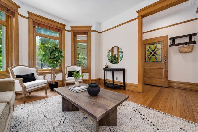 a living room with furniture and a window