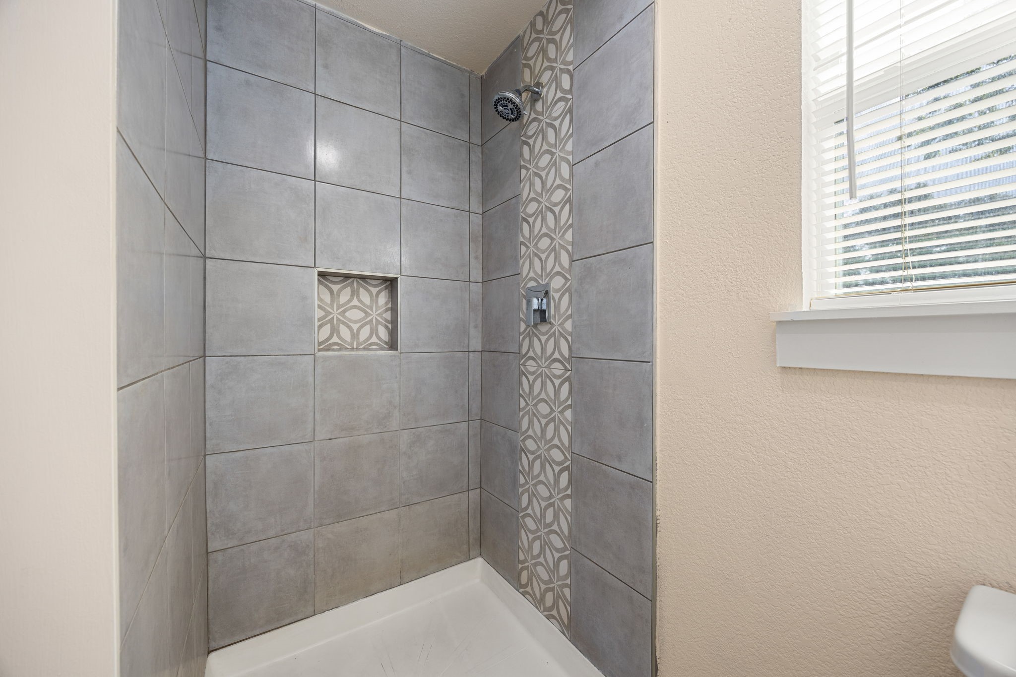 6122 Beldart Street Houston, TX 77033 - Photo 12 of 24 a bathroom with a shower and a toilet