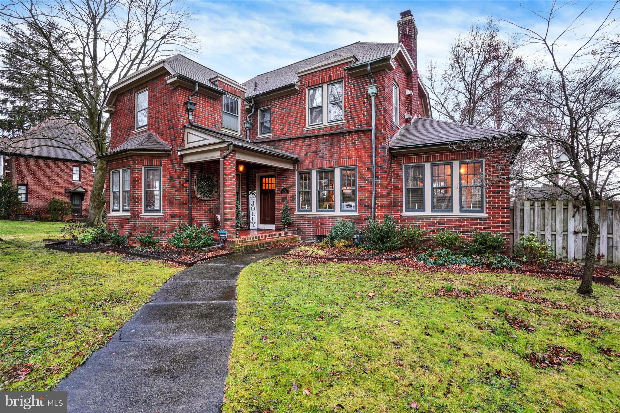 185 Peyton Road York, PA 17403 - Photo 3 of 38 a front view of a house with yard and green space