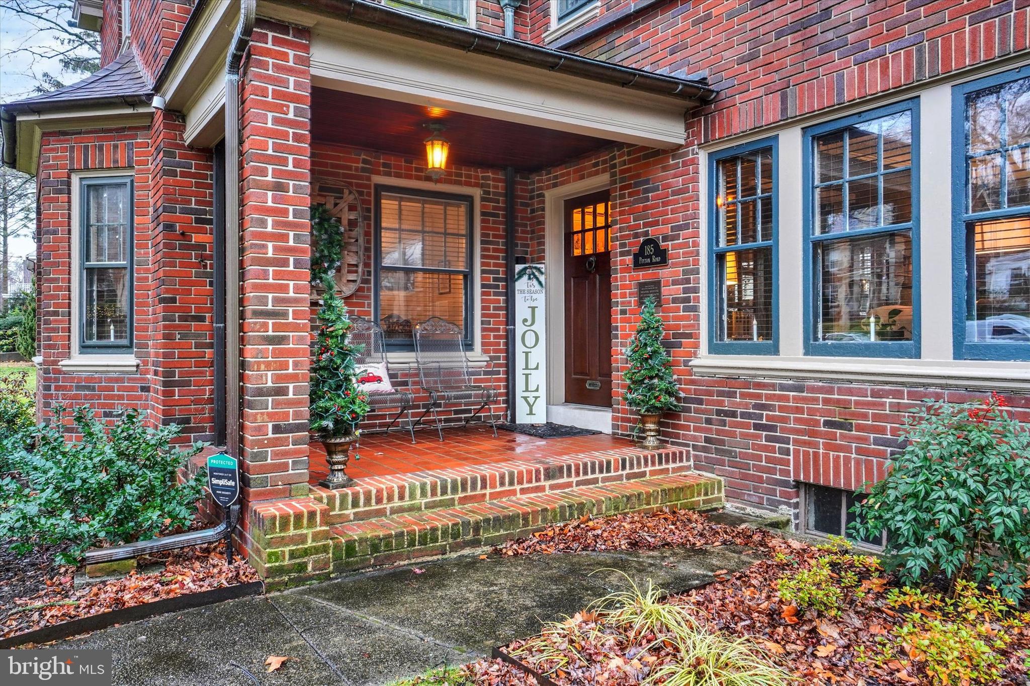 185 Peyton Road York, PA 17403 - Photo 4 of 38 front view of a brick house with a small yard