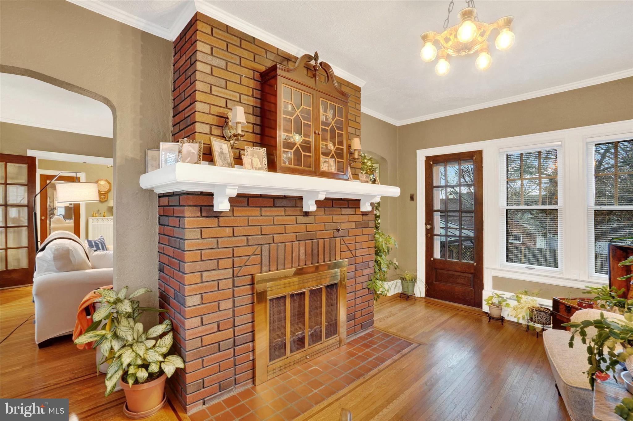 185 Peyton Road York, PA 17403 - Photo 9 of 38 a living room filled with furniture hardwood floor and a fireplace