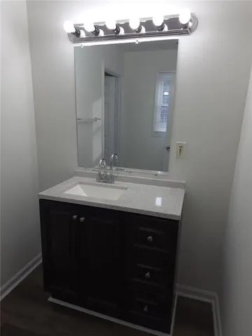 a close view of a sink and mirror