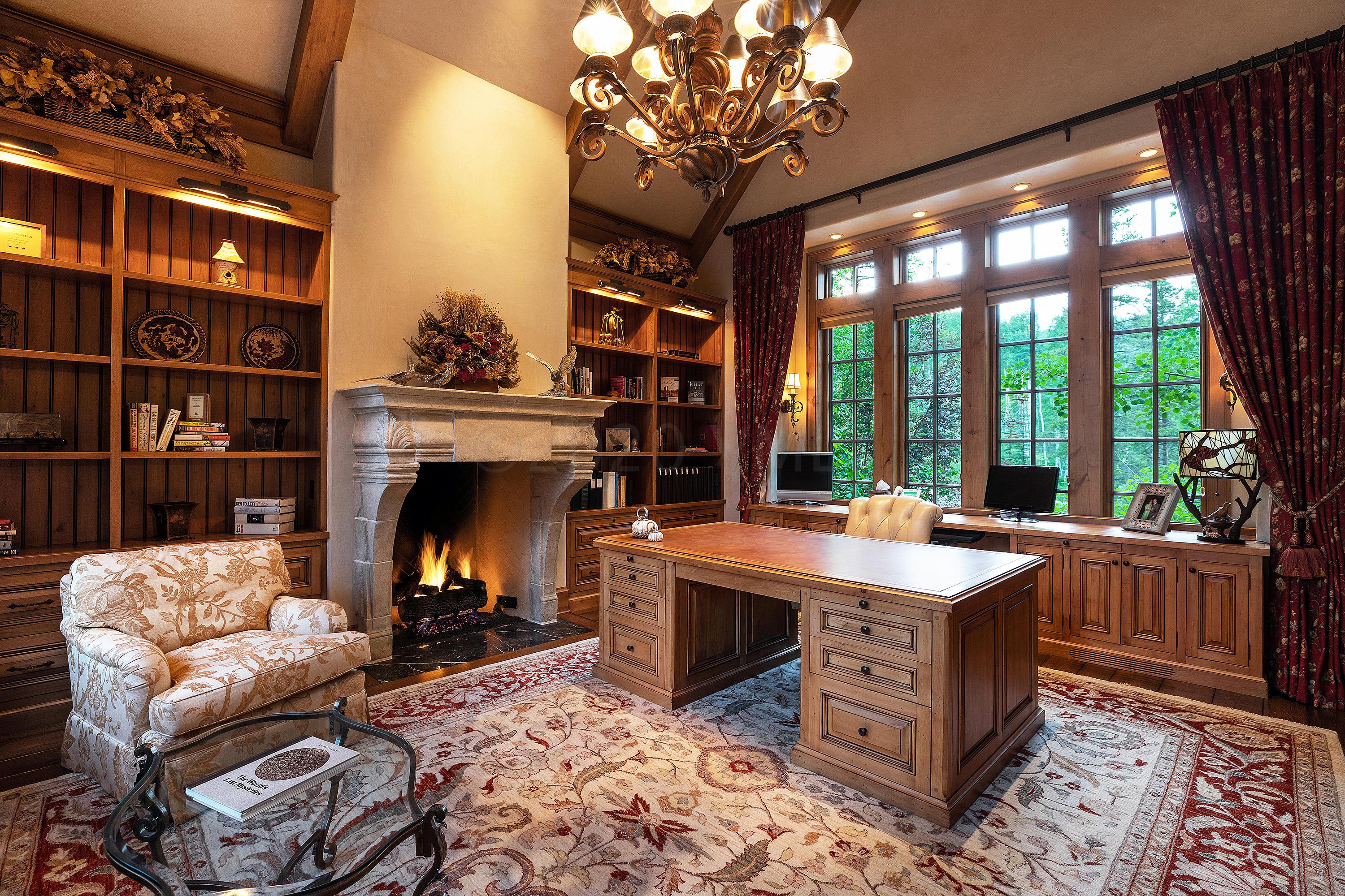 3882 Daybreak Ridge Road Avon, CO 81620 - Photo 14 of 33 a view of a livingroom with furniture and a fireplace