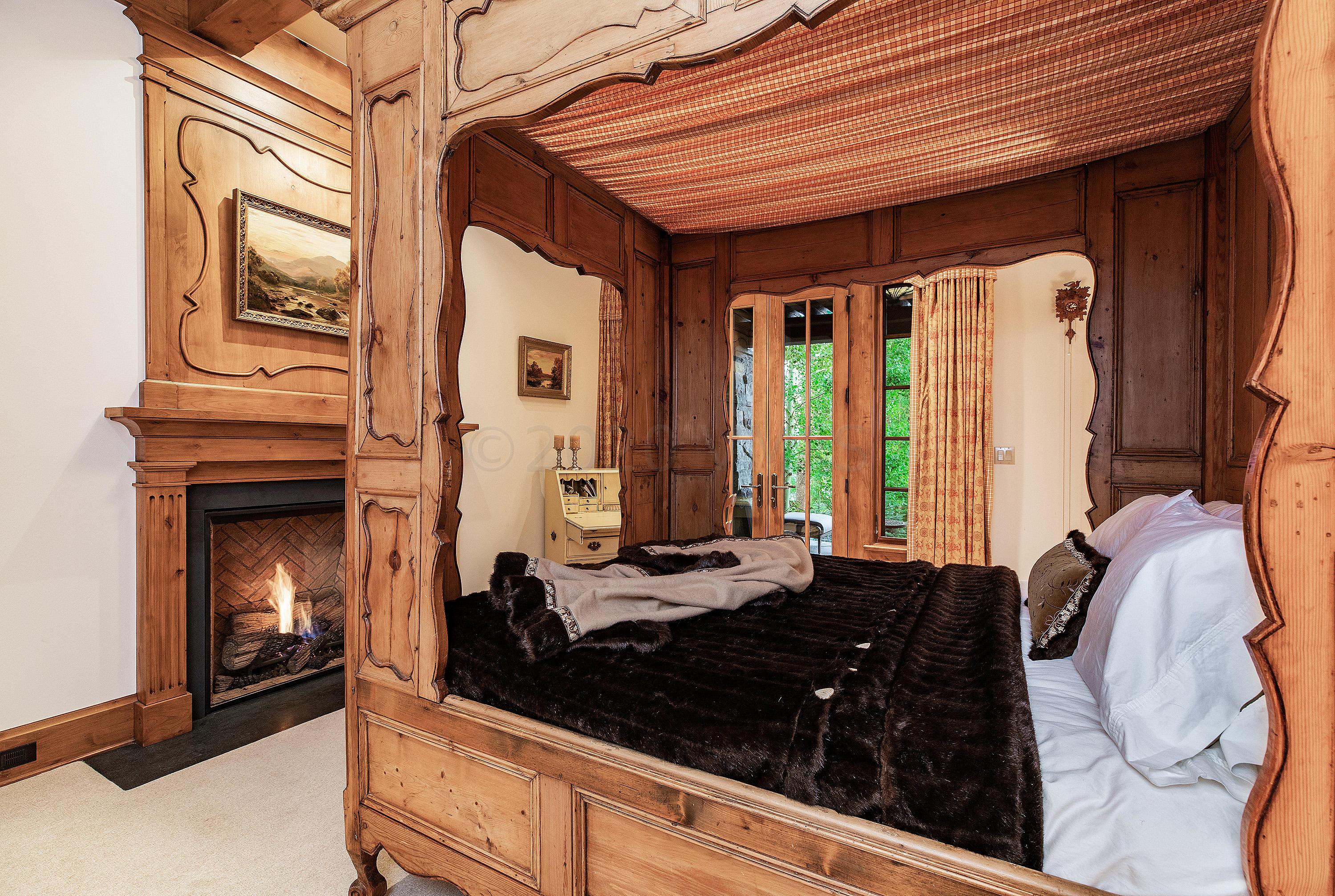 3882 Daybreak Ridge Road Avon, CO 81620 - Photo 25 of 33 a living room with furniture and large windows