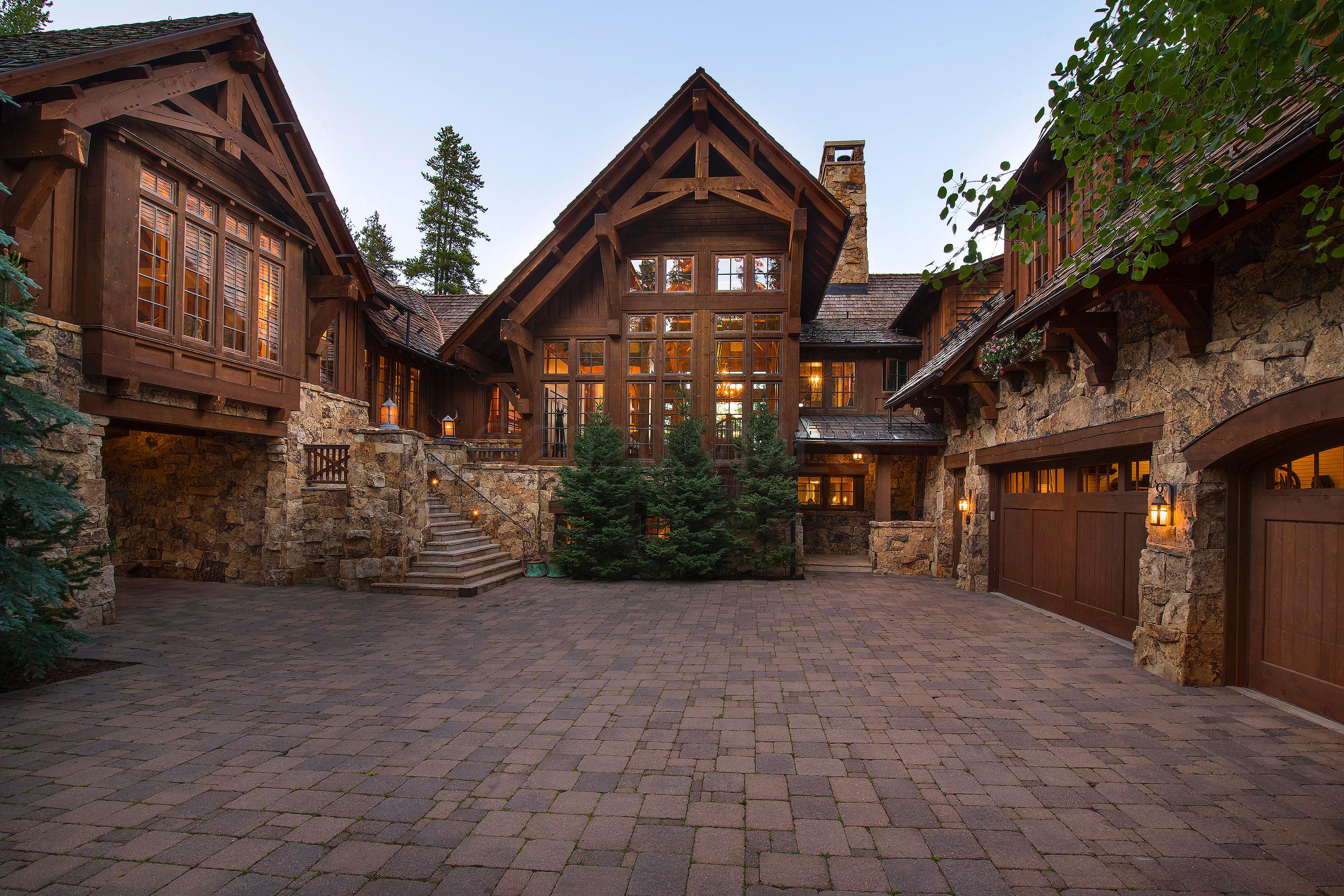 3882 Daybreak Ridge Road Avon, CO 81620 - Photo 32 of 33 a view of a building with a yard