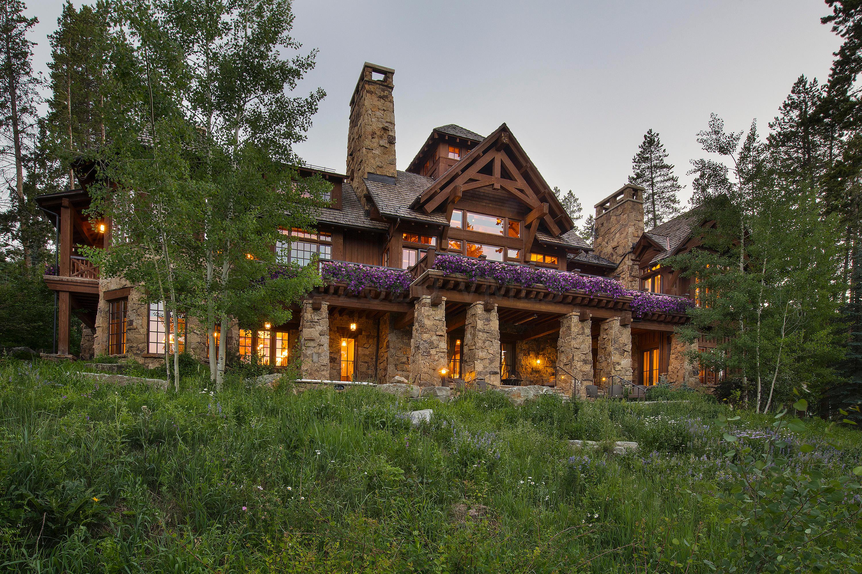3882 Daybreak Ridge Road Avon, CO 81620 - Photo 33 of 33 a front view of a house with garden