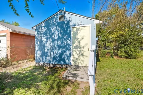 a view of door with yard