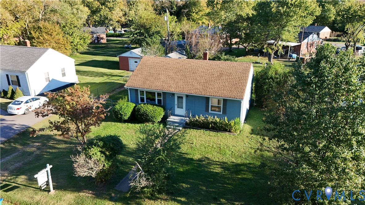 4216 Sheffield Road Richmond, VA 23224 - Photo 2 of 23 a front view of a house with garden