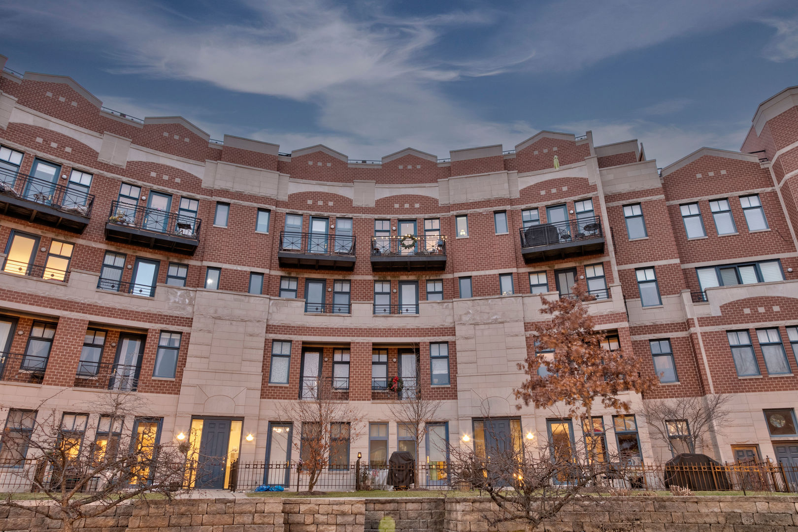a front view of a building with balcony