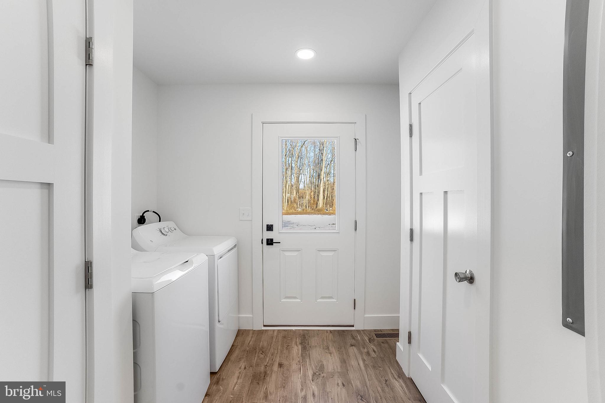 1255 Rose Valley School Road Dover, DE 19904 - Photo 9 of 26 a view of a hallway with wooden floor