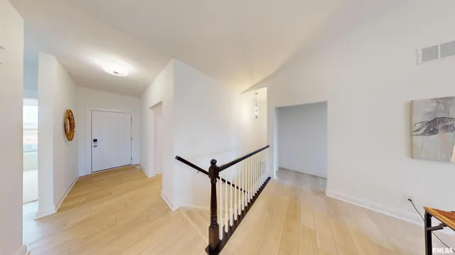 a view of a hallway with entryway