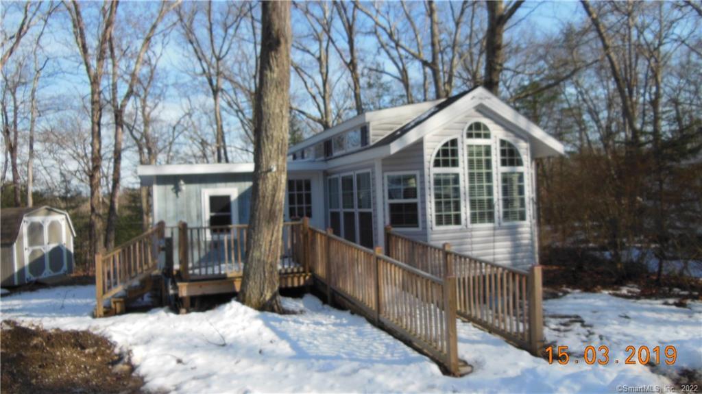 28 Nowakowski Road, Unit 6H Griswold, CT 06351 - Photo 1 of 1 a view of a house with a yard